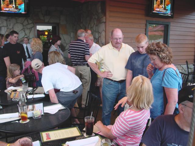 Roy Skeggs, wife Libby, and their son.