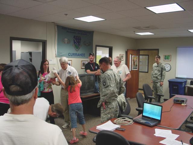 The pet Bulldog ran through to greet everyone.