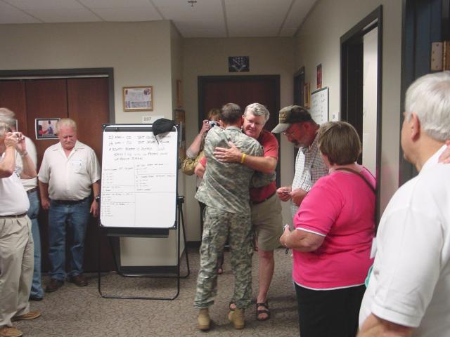Tom Weides receives a Challenge Coin