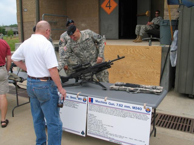 Roy Skeggs getting a run-down on the M240 features