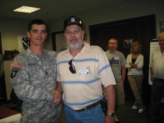 Jim Roesch receives a Challenge Coin